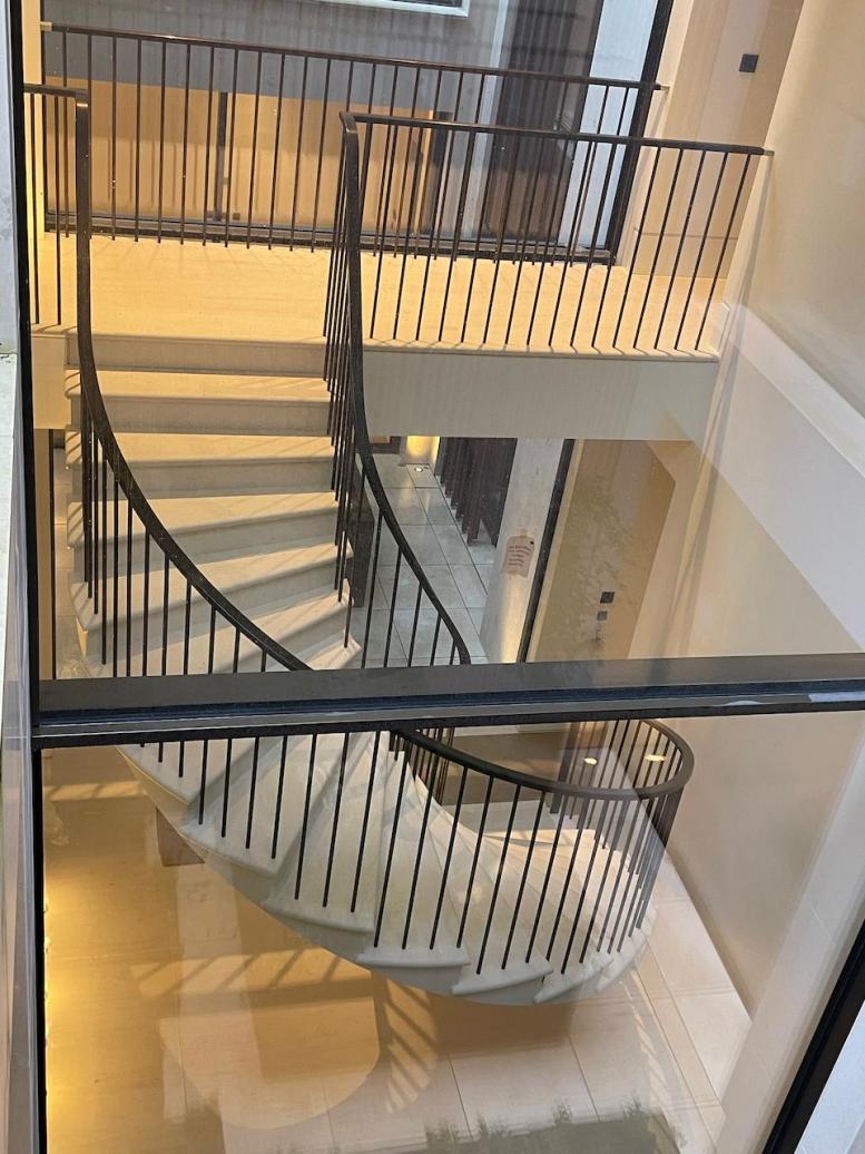 Floating - Post tensioned stone staircase Kensington, London